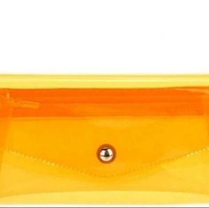 New w/o tags Transparent Neon Clutch